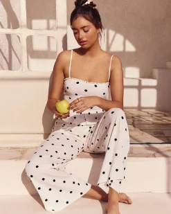 Pantalon matière texturée motifs à pois