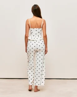 Pantalon matière texturée motifs à pois
