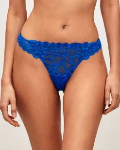 Tanga en mesh avec broderies florales